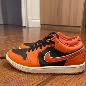 Black and Orange Nike Air Jordans